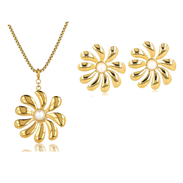 Elegant gold flower set with necklace and earrings. Large flower pendant and radiant pearls. Perfect for any occasion. My Bendel.