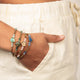 Goldenes Amazonit-Armband mit Blumenanhänger