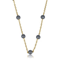 Goldene Gliederkette mit schwarzen Perlen - Feines Design