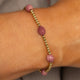 Edelsteinarmband mit facettierten ovalen Perlen • Rhodonit