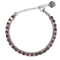 Silbernes Armband mit lila Glasperlen